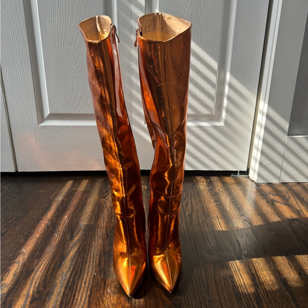 Metallic orange knee high boots